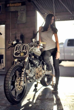A true motorcycle babe...love motrocycle supercross and long weekend trips to nowhere....Kim